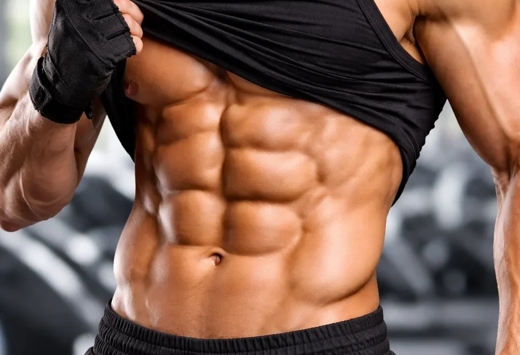 muscular man showing six pack abs fitness body transformation