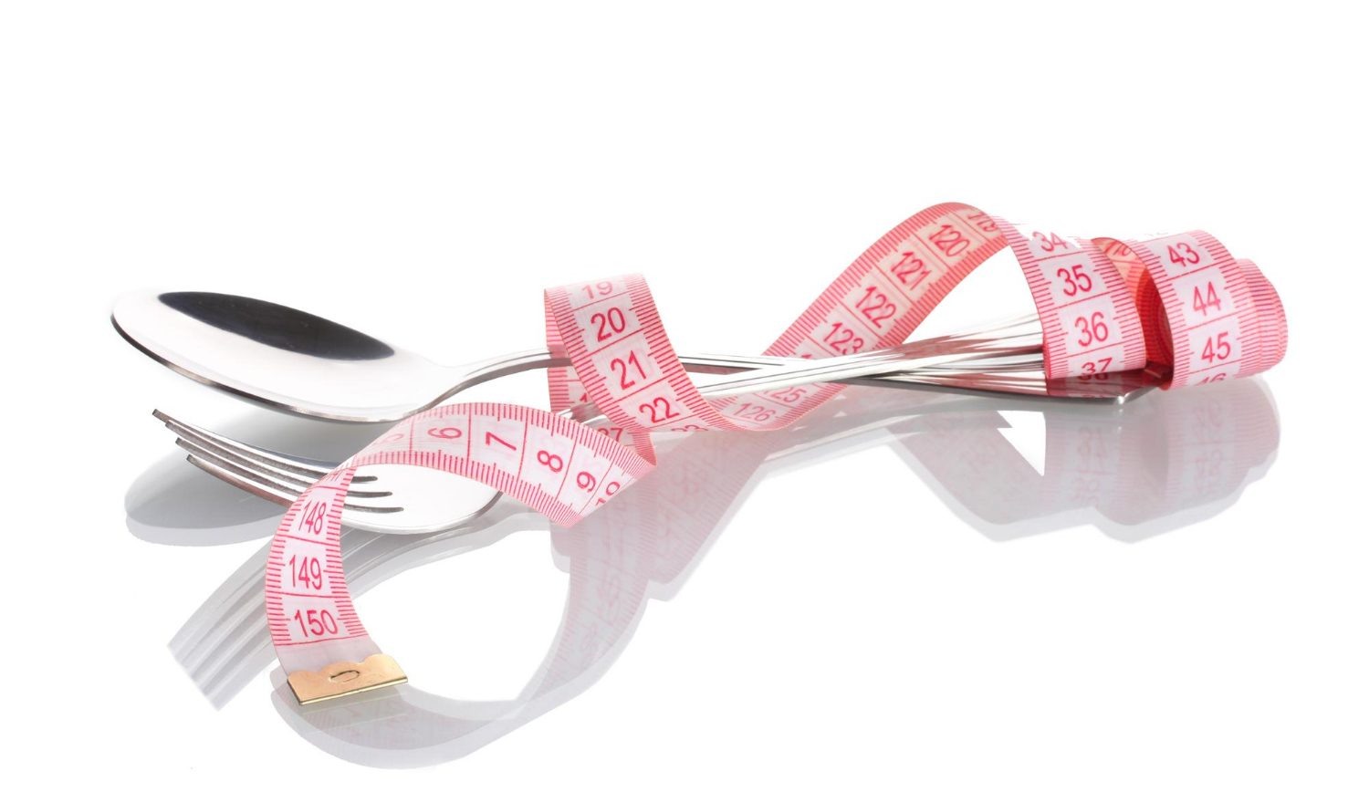 tape-fork-diet-health-53416 Fork spoon and measuring tape isolated on white