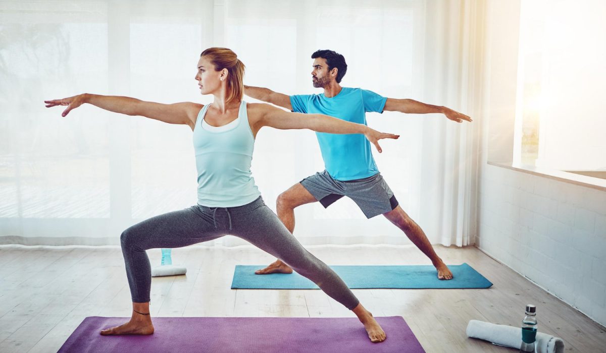 Pilates stretching and couple in home with yoga mat for spiritual fitness