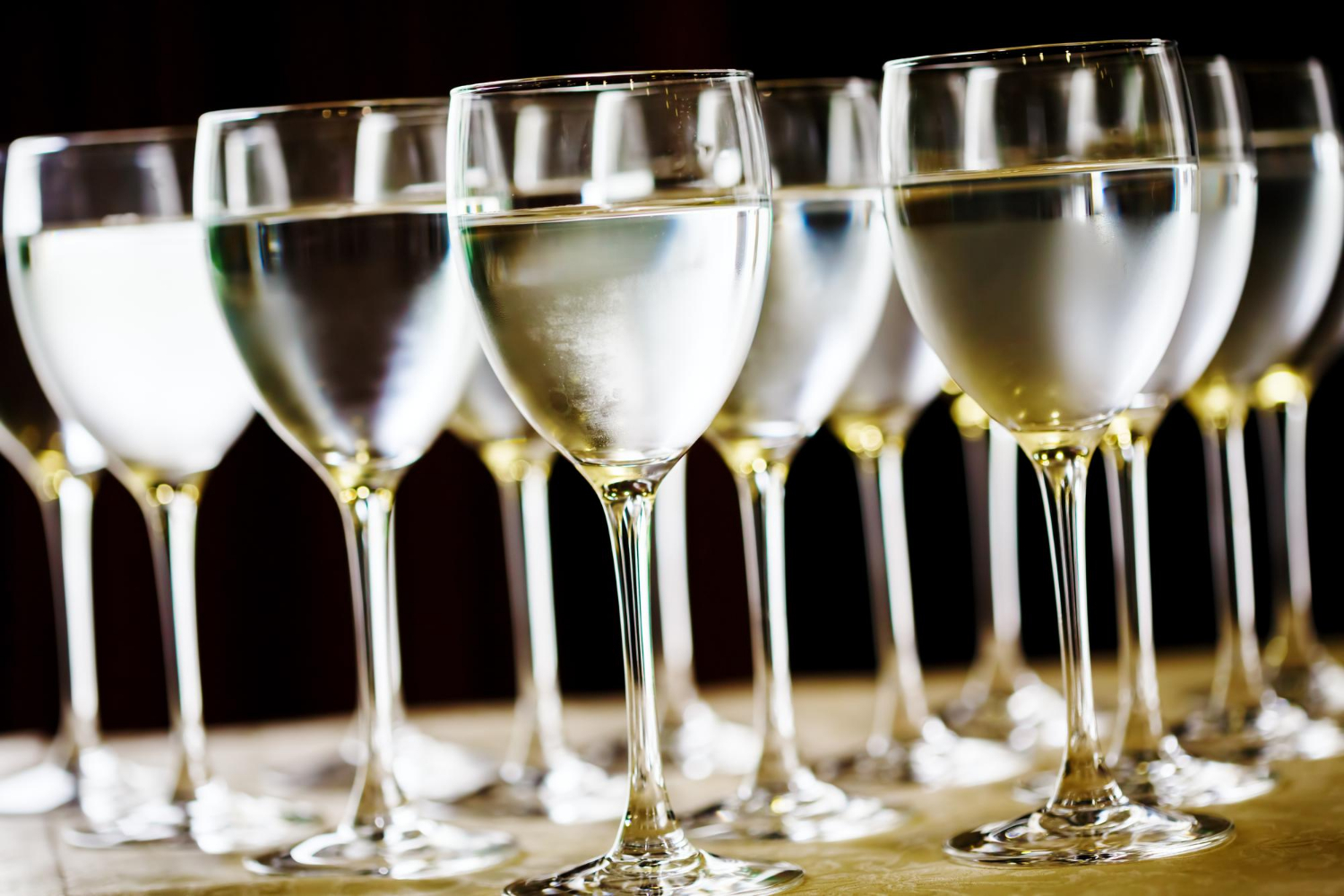 close-up of wine glasses on table